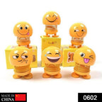 Spring doll with smiling face emoticon
